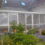 ogród zimowy pomiędzy ścianami