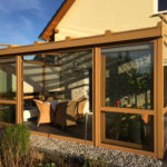 otwarty ogród zimowy latem