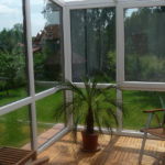 ogród zimowy z parkietem